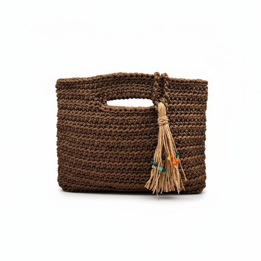Handcrafted Porto Terra Bag in chocolate brown with straw tassel charm