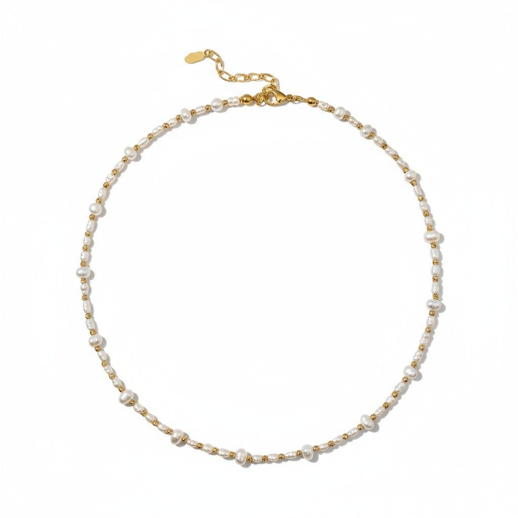 Delicate freshwater pearl necklace with gold-plated accents in a minimalist design