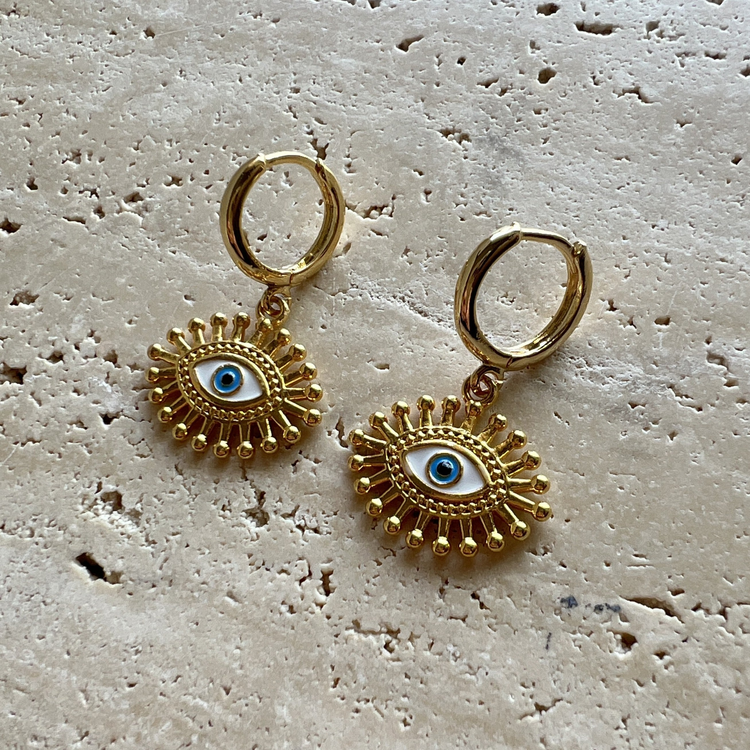 Protective eye necklace with gold accents and talisman design