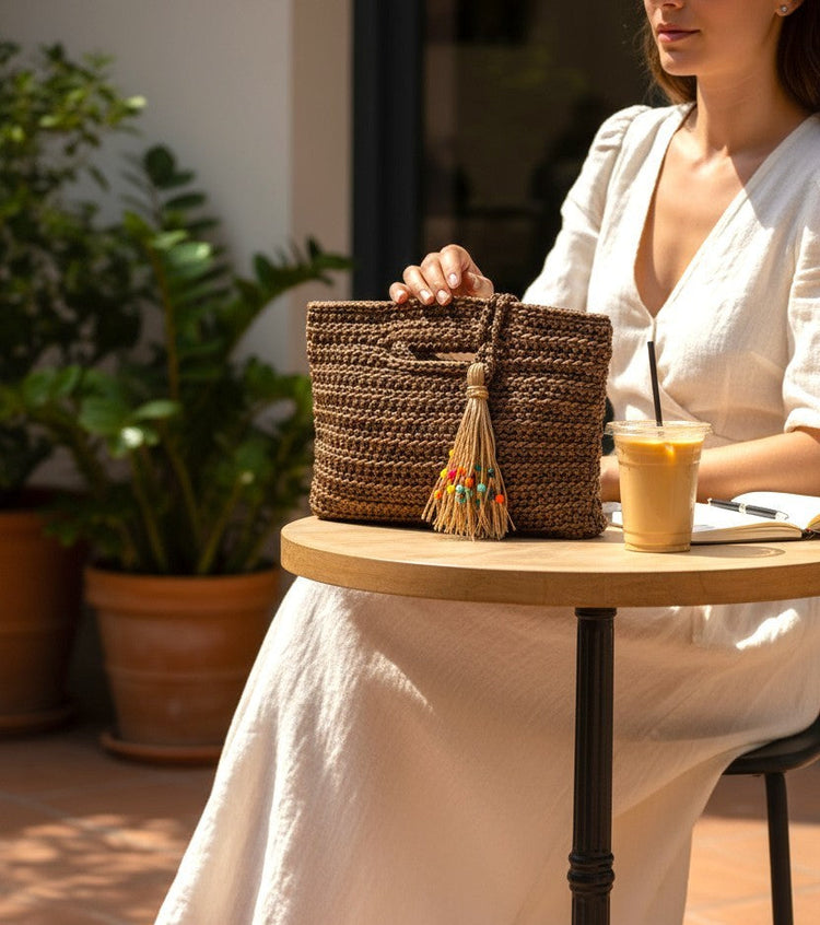 Handwoven satin cord bag with straw tassel charm and colorful beads