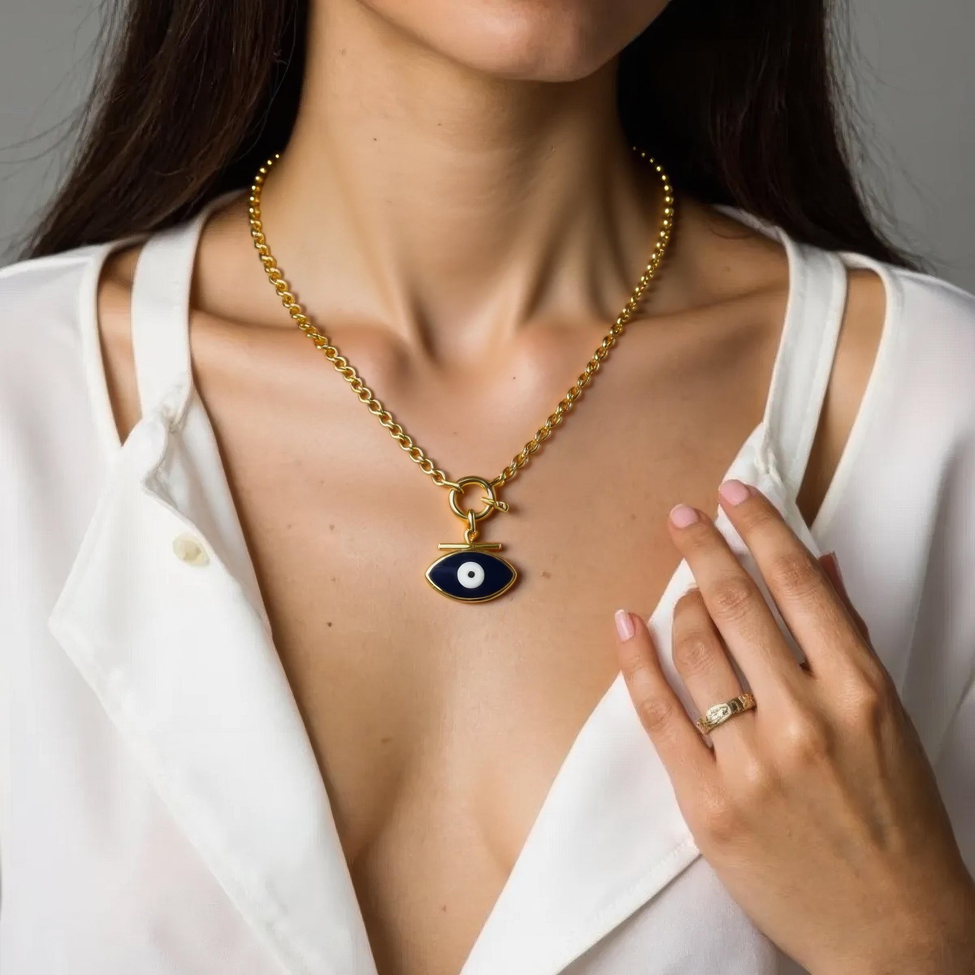 Chunky gold chain necklace with navy enamel evil-eye pendant
