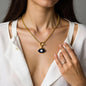 Chunky gold chain necklace with navy enamel evil-eye pendant