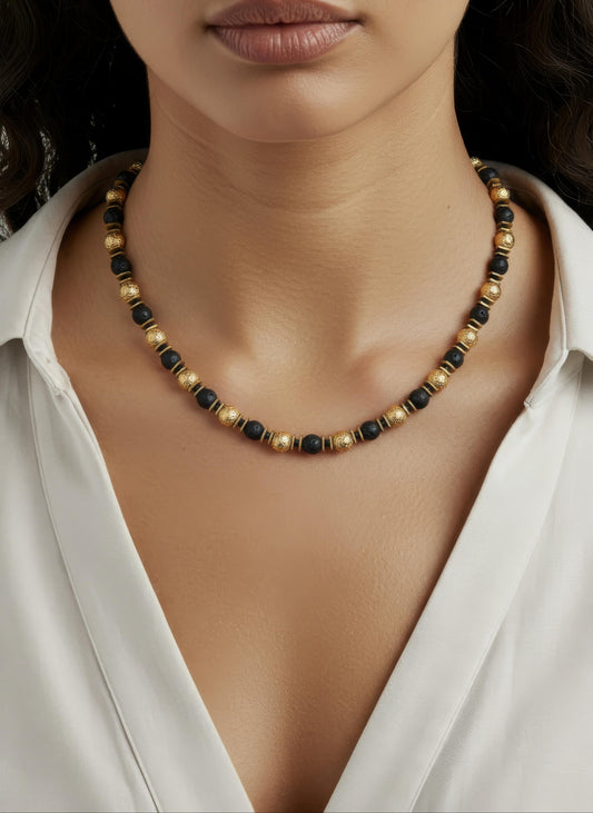 Black lava stone and hematite necklace with subtle gold accents