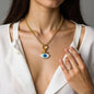 Gold chain necklace with white enamel evil-eye pendant