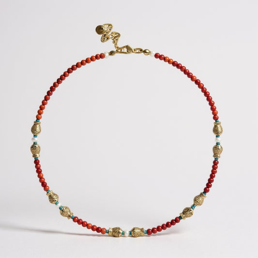Coral and freshwater pearl necklace with gold-plated fish charms
