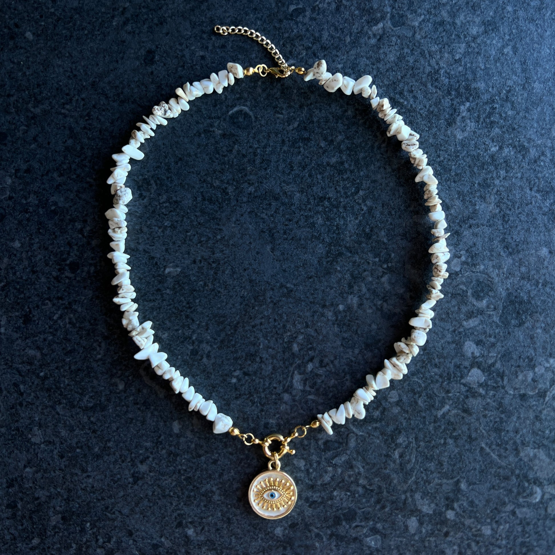 White moonstone necklace with gold enamel evil eye pendant