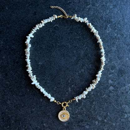 White moonstone necklace with gold enamel evil eye pendant