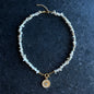 White moonstone necklace with gold enamel evil eye pendant