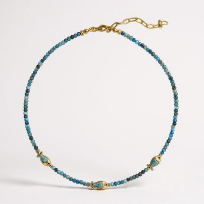 Apatite beaded necklace with three gold-plated mother-of-pearl fish charms