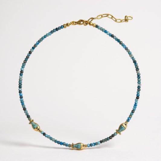 Apatite beaded necklace with three gold-plated mother-of-pearl fish charms