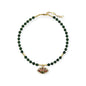 Emerald jade and gold necklace with red sunburst evil eye pendant