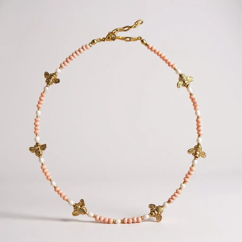 Pink crystal and freshwater pearl necklace with gold-plated bee charms