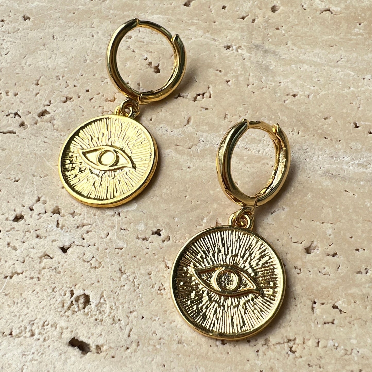 Gold engraved evil eye medallion hoop earrings