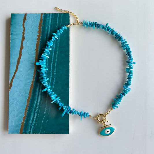 Turquoise chip necklace with gold enamel evil eye pendant