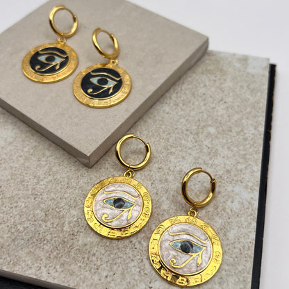 Gold Eye of Horus medallion earrings with turquoise and black enamel