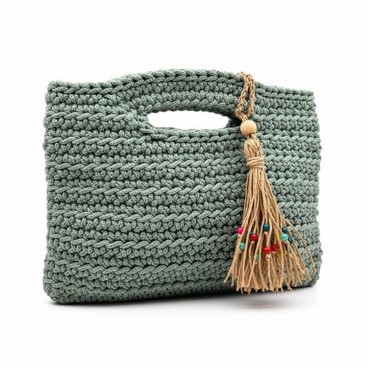 Handwoven Amalfi Teal Bag with built-in handles and straw tassel charm