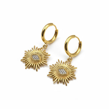 Gold sunburst earrings with zircon center on polished hoops