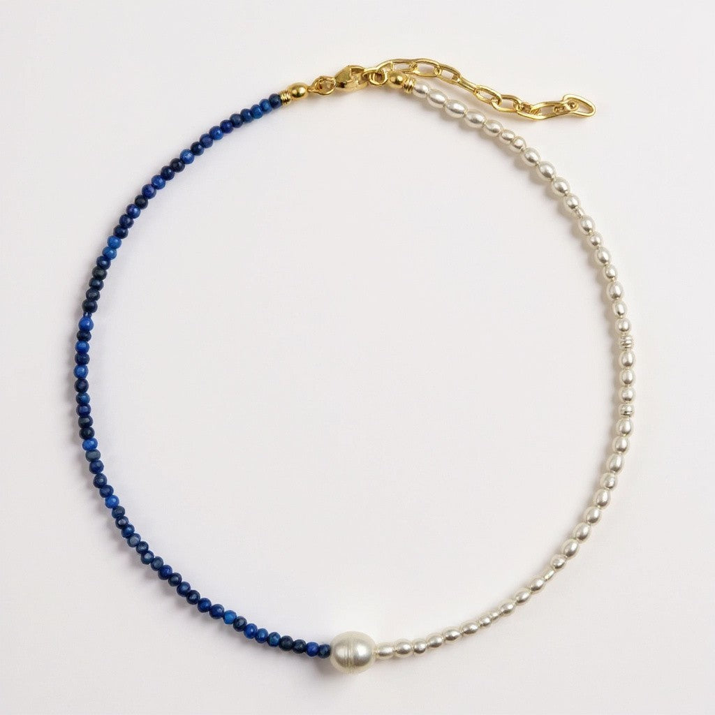 Lapis lazuli and freshwater pearl necklace with a central pearl accent