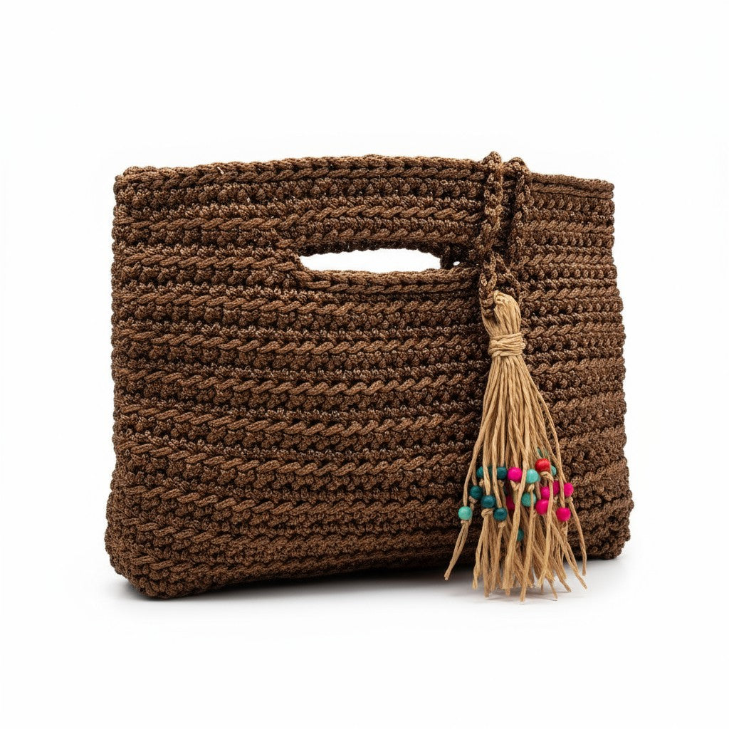 Handcrafted Porto Terra Bag in chocolate brown with straw tassel charm