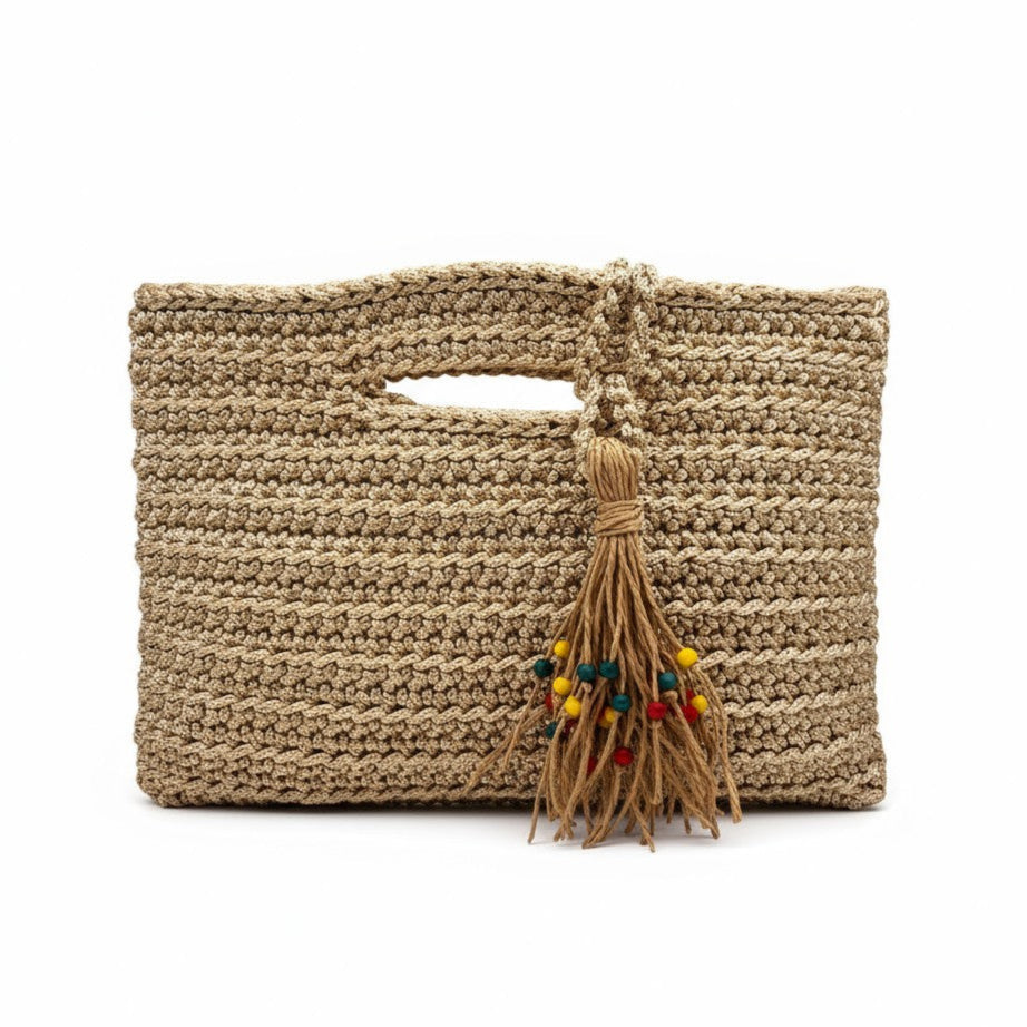 Handcrafted Luma Nude Bag with straw texture and colorful tassel charm