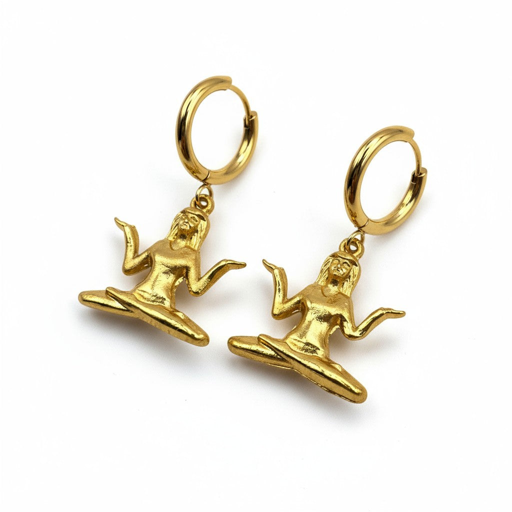 Gold hoop earrings with meditative figure pendant