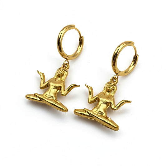 Gold hoop earrings with meditative figure pendant