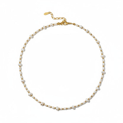 Delicate freshwater pearl necklace with gold-plated accents in a minimalist design