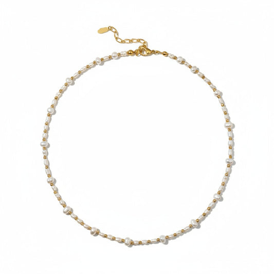 Delicate freshwater pearl necklace with gold-plated accents in a minimalist design